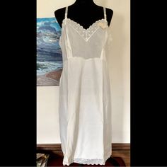 Amazing Find, Brand New Collectible 1960s Barbizon Slip Trimmed With Eyelet Lace With Adjustable Straps. Form Fitted Bodice. Wonderful Gift For The Romantic Vintage Lover In Your Life. (You?) Arm Pit To Arm Pit 20” Bust 44” Arm Pit To Hem 32” Trousseau, Gift, Valentine’s Etc. White Vintage Sleepwear With Delicate Lace, Vintage Sheer Sleepwear, Fitted Vintage Sleepwear With Lace Trim, Fitted Vintage Sleepwear, Vintage Summer Sleepwear With Delicate Lace, Vintage Delicate Lace Sleepwear, Polka Dot Lingerie, Babydoll Nightgown, Vintage Slip Dress