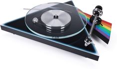 a turntable with a rainbow flag on the side and a stick sticking out of it