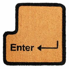 a door mat with the word enter and an arrow pointing to the right on it