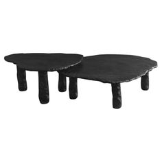 two black tables sitting on top of each other