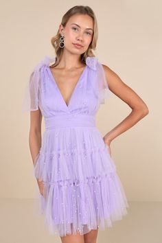 Tulle-Proof Lavender Tulle Beaded Tie-Shoulder Tiered Mini Dress Evening Lavender Tulle Dress, Lavender Evening Dress For Spring Prom, Purple Sweetheart Neckline Summer Evening Dress, Glamorous Lavender Wedding Dress, Sleeveless Lavender Tulle Dress, Lavender Prom Dress For Summer, Lavender Mini Dress For Prom And Summer, Lavender Mini Dress For Prom And Spring, Lavender Mini Dress For Wedding