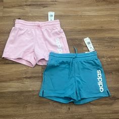 These Are Two Brand New Pairs Of Adidas Shorts! They Are Both A Size Xs With A An Adjustable Tie Around The Waist! They Are Pink And Blue And Will Be Sold Together! There Is No Liner Inside, They Are A Soft Cloth Like Shorts! Adidas Cotton Bottoms With Built-in Shorts, Adidas Athleisure Shorts For Spring, Adidas Pink Shorts For Spring, Pink Adidas Athleisure Shorts, Adidas Pink Athleisure Shorts, Adidas Spring Shorts With Elastic Waistband, Pink Adidas Sports Bottoms, Pink Adidas Shorts For Sports, Adidas Pink Sports Bottoms