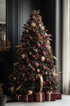 a christmas tree with red and gold ornaments