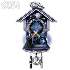 a star wars clock with lights up and darth vader on it