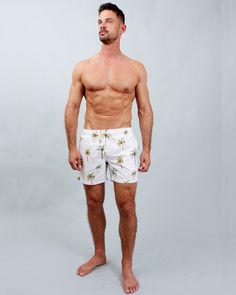 Sport a stylish look with these beige swim shorts, featuring a unique palm tree design. Benefits: Fashionable and environmentally responsible, made from recycled materials. Quick-drying fabric for superior comfort and convenience. Perfect for beach days or lounging by the pool. Practical design includes a hidden pocket and a "wet bag" for essentials. We donate 10% of all swim shorts sales to SANCCOB, supporting the rescue and rehabilitation of African penguins and seabirds. Piscine Design, Palm Tree Design, Swim Shorts Women, Summer Swimwear, Mens Swim Shorts, Pyjama Bottoms, Wet Bag, Hidden Pocket, Lounge Shorts