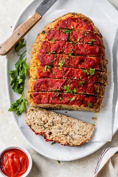 This healthy turkey meatloaf recipe won't let you down! Thanks to a few simple tricks, it's unbelievably moist and super flavorful.