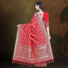 Category - Pure Katan Silk Banarasi Saree. Khinkhwab brings you an exclusive Katan range that is sure to make you fall in love with.This elegant traditional red katan handloom Kadua saree with Leheriya (waves) work all over is just the right pick to make a stunning statement. The silver and gold zari weaving (Sona Rupa work) done all over to make leheriya design makes it a stunning, elegant and regal saree. Fabric - Pure Banarasi Katan Silk. Katan is a thread, prepared by twisting a different nu Red Art Silk Pre-draped Saree With Self Design, Designer Red Paithani Silk Pre-draped Saree, Red Chanderi Pre-draped Saree With Zari Weaving, Red Katan Silk Pre-draped Saree For Designer Wear, Designer Red Pre-draped Saree With Self Design, Red Pre-draped Saree With Zari Weaving In Dola Silk, Red Pre-draped Saree With Zari Weaving On Dola Silk, Traditional Red Pre-draped Saree With Zari Work, Red Traditional Pre-draped Saree With Zari Work