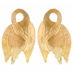 Golden swans in elegant repose are hand shaped out of brass. Sterling silver posts. Nickel and lead free. 3.75" [9.5 cm] long. Swan Earrings, Swan Jewelry, Gold Swan, Magical Jewelry, Bird Jewelry, Hand Shapes, Brass Jewelry, Swans, Jewelry Inspo