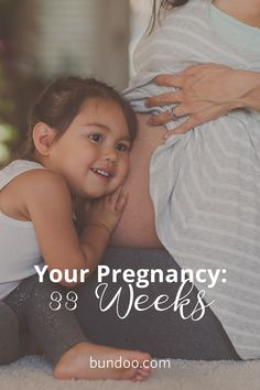 a pregnant girl hugging her belly with the words, your pregancy 8 weeks