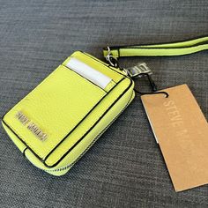 Brand New Hard To Find Steve Madden Card Case Cardholder Lemon Color Silver Hardware Zip Around Compartment One Id Window Three Creditcard Pockets Approximately 4.5”X 3.25”X 1” Pet & Smoke Free Home Please See My Entire Collection Yellow Travel Bags With Card Slots, Trendy Yellow Wallet For Daily Use, Yellow Wallets With Rfid Blocking For Daily Use, Yellow Travel Coin Purse With Card Slots, Travel-friendly Yellow Coin Purse With Card Slots, Trendy Yellow Wallets For Everyday Use, Trendy Yellow Wallet For Everyday Use, Yellow Rectangular Wallet With Rfid Blocking, Yellow Coin Purse For Everyday Use