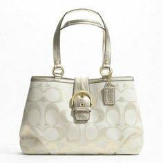 New In Plastic Coach Soho Signature Metallic Carryall Purse Bag Ivory Gold F20583 New Hangtag Signature Metallic Fabric With Metallic Leather Trim Inside Zip, Cell Phone And Multifunction Pockets Zip-Top Closure, Fabric Lining Handles With 8 3/4" Drop 15 1/4" (L) X 9 1/2" (H) X 4 3/4" (W) This Is A Signature Product Chic Cream Coach Shoulder Bag, Beige Tote Bag With Silver-tone Hardware, Cream Bags With Gold-tone Hardware For Shopping, Cream Bags With Gold-tone Hardware For Errands, Coach Cream Shoulder Bag With Handle Drop, Everyday Cream Bags With Silver-tone Hardware, Chic Cream Coach Bag, Elegant Cream Bags With Handles, Cream Bags With Silver-tone Hardware For Daily Use