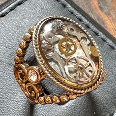 "Embrace the charm of our delightful steampunk ring, a unique handmade accessory that captures the spirit of vintage style. Crafted with care, this ring features intricate details like clock gears and decorative accents, making it a standout piece in any jewelry collection. Perfect for layering with other rings or wearing on its own, it adds a whimsical touch to both casual and formal outfits. Celebrate your unique style and make a statement with this enchanting ring!" Steampunk Ring, Old Pocket Watches, Clock Gears, Steampunk Rings, Formal Outfits, Decorative Accents, Ring Unique, Formal Outfit, Handmade Accessories