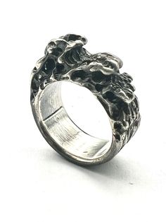 Solid 925 sterling wave ring inspired by "The Great Wave off Kanagawa" atrwok from the late artist, Hokusai . A unique unisex design hand carved in wax then cast using the lost wax casting method.   A solid ring weighing in at 17g for UK size Q (weight will vary slightly with ring size) Each piece is made to order, please allow upto 4 weeks for your ring to be made and delivered. Includes free Royal Mail Special delivery . Any questions please let me know. Thanks for looking! The Great Wave, Great Wave Off Kanagawa, Wave Ring, Wax Casting, Lost Wax Casting, Special Delivery, Lost Wax, Unisex Design, Great Wave