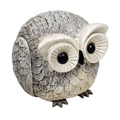 an owl figurine is shown on a white background