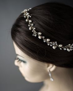 The essence of bridal elegance, this exquisite 14-inch wedding hair vine is adorned with lustrous freshwater pearls and dazzling rhinestones. Use it as a headband, bun wrap, or to add a touch of refined sophistication to your wedding day hairstyle. With a loop at each end for securing with a bobby pin, you can dance the night away in glorious wedding glamour! Longer version here! Headband Bun, Long Wedding Hair, Wedding Day Hairstyle, Long Hair Vine, Pearl Halo, Vine Headband, Pearl Headband Wedding, Wedding Glamour, Bun Wrap