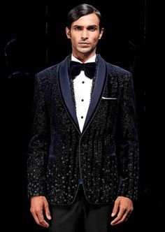 The classic galactic tuxedo is tailor-made for the modern man. Single-buttoned satin detail shawl collar. Best accompanied with a pair of black flat-front trousers, this is the perfect evening wear. Tuxedo Blazer For Black-tie Gala Events, Elegant Black Suits For Holiday Season, Elegant Black Holiday Suit, Tailored Elegant Tuxedo For Gala, Luxury Tuxedo For Semi-formal Gala, Luxury Suits For Evening Gala, Luxury Tuxedo For Semi-formal Gala Events, Winter Black Tie Tuxedo With Notch Lapel, Evening Suits For Gala