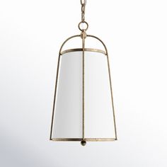 a hanging light fixture with a mirror on the front and back sides, in an antique brass finish