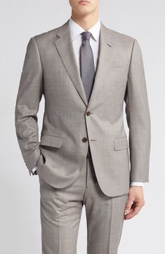 Dapper and distinctive, this pale-brown wool suit features traditional detailing and makes a smart choice for warm-weather occasions. Jacket has notched lapels; four-button cuffs; chest pocket; flap pockets; side vents Trousers have zip fly with button-tab closure; slant pockets; back button-welt pockets Jacket is lined; trousers are lined to the knee 100% virgin wool Dry clean Imported Luxury Neutral Outerwear For Formal Occasions, Luxury Neutral Outerwear For Formal Events, Elegant Neutral Suits For Business, Elegant Neutral Suits For Formal Occasions, Elegant Neutral Formal Suit, Formal Beige Sport Coat With Suit Collar, Tailored Beige Sport Coat For Formal Occasions, Classic Brown Three-piece Suit With Long Sleeve, Beige Sport Coat With Suit Collar For Formal Occasions