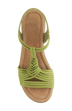 Intricately woven straps define the vamp of a versatile stretch-elastic sandal finished with a soft, cushioned footbed for all-day adventures. Textile and synthetic upper/synthetic lining and sole
 Imported Strappy Synthetic Slingback Sandals For Beach, Strappy Synthetic Slingback Sandals For Vacation, Synthetic Strappy Slingback Sandals For Vacation, Strappy Synthetic Wedge Sandals With Arch Support, Synthetic Strappy Wedge Sandals With Arch Support, Strappy Slingback Sandals With Cushioned Footbed For Vacation, Casual Adjustable Slingback Sandals With Woven Sole, Synthetic Strap Sandals For Vacation, Vacation Sandals With Synthetic Strap