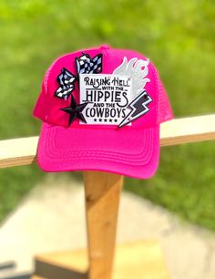 Hot pink on hot pink trucker hat with "Raising Hell with the hippies and the cowboys" patch designs. These are made to order in house please allow a max of 10-14 business days. Product may be ready sooner depending on current demand. Thank you so much! Pink Western Cap Hat, Western Style Pink Cap, Fun Pink Hat For Music Festival, Trendy Pink Hats For Music Festival, Pink Western Style Cap, Pink Hat For Rodeo, One Size Fits Most, Casual Pink Trucker Hat For Festival, Pink Hip Hop Hat, One Size Fits Most, Fun Pink Hats For Country Events