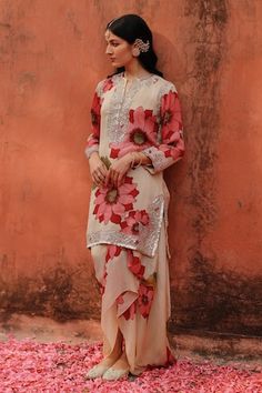 Ivory kurta with all over handpainted kalamkari floral blossom motifs, highlighted by floral sequin cutwork embellishments. Comes with matching draped skirt. - Aza Fashions Archana Jaju, Kurta With Skirt, Petal Skirt, Set Saree, Kurta Dress, Punjabi Salwar Suits, Paneled Skirt, Draped Skirt, Skirt For Women