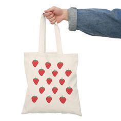 This is a cute one side printed strawberry tote bag. With a wide range of captivating prints and patterns to choose from, you can find the perfect bag to complement your style, whether you're heading to the beach, the market, or a night out with friends. Cute Strawberry Print Bags For Everyday Use, Rectangular Bags With Strawberry Print For Gifts, Rectangular Bags With Strawberry Print As Gift, Rectangular Strawberry Print Bag For Gifts, Pink Strawberry Print Bag As Gift, Rectangular Bag With Strawberry Print As Gift, Rectangular Strawberry Print Bag As A Gift, Red Bag With Strawberry Print As Gift, Casual Rectangular Bag With Strawberry Print