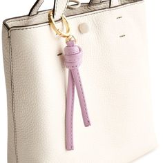 Add a touch of flair to your bag or backpack with our Every Day Bag Charm. Designed to elevate your accessory game, this stylish charm features a stylized tassel that adds a playful and sophisticated touch to any bag, making it the perfect accessory to express your unique sense of style. Vera Bradley Every Day Bag Charm Keychain in Purple Elegant Everyday Bag Charm With Logo, Logo Charm Bag For Everyday Use, Everyday Bag Charm With Lobster Clasp, Elegant Bag Charm With Logo, Chic Bags With Logo Charm For Everyday, Elegant Bag Charm For Everyday Use, Trendy Bag Charm As A Gift, Elegant Rectangular Bag Charm, Rectangular Logo Bag Charm