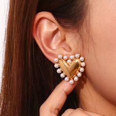 Details: Stainless steel. Water resistant. Modern Heart-shaped Metal Jewelry, Trendy Gold Jewelry With Heart Print, Modern Metal Jewelry For Valentine's Day, Modern Heart-shaped Party Jewelry, Pearl Heart Earrings, Gold Pearl Bracelet, Contemporary Vintage, Zara Jewelry, Pearl Cuff