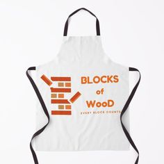 an apron with the words blocks of wood printed in orange and black on white background