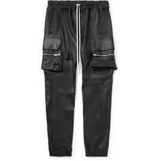 These 'Mastodon' cargo trousers are trademark Rick Owens. Cut in a skinny fit from leather, they have zipped cargo pockets and a comfortable elasticated waistband with signature elongated drawstrings. Rick Owens Collection, Mens Cargo Trousers, Casual Trousers, Cargo Trousers, Mr Porter, Mens Trousers, Rick Owens, Porter, Trousers