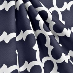 an image of a blue and white fabric with geometric design on it's side