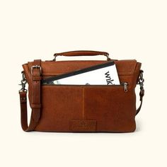 Ryder Reserve Bison Leather Laptop Messenger Bag | Brown Travel Satchel In Cognac With Palladium Hardware, Rugged Satchel With Adjustable Strap For Everyday Use, Rugged Bag With Adjustable Strap For Everyday Use, Rugged Leather Shoulder Bag For Everyday Use, Everyday Leather Briefcase With Gunmetal Hardware, Everyday Satchel With Palladium Hardware, Rugged Leather-backed Satchel For Everyday, Brown Saddle Bag With Palladium Hardware, Rugged Crossbody Bag For Everyday Use