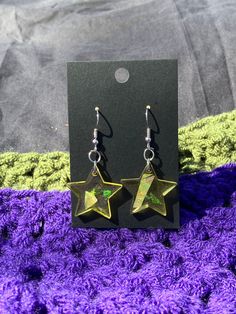 Small Star Earrings    Materials    Resin    Holographic bits    Jump rings    Earrings hooks Star-shaped Crystal Earrings For Gifts, Star-shaped Pierced Earrings As Gift, Star-shaped Pierced Earrings For Gifts, Star Shaped Pierced Earrings For Gifts, Green Star Earrings For Pierced Ears, Star-shaped Nickel-free Plug Earrings As Gift, Star-shaped Nickel-free Plug Earrings For Gift, Nickel-free Star Shaped Plug Earrings For Gift, Star Shaped Nickel Free Plug Earrings For Gift