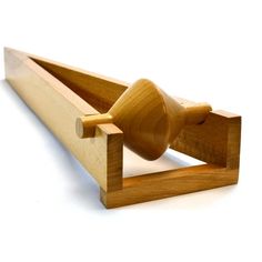 a wooden toy with a handle on it