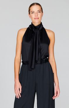 An elegant tie neck blouse cut in luxurious silk satin. The full ties can be worn loose down the back or draped around the neck and the elegant halter neckline is perfect worn alone or under a jacket. Satin Tie Back Halter Top For Evening, Evening Satin Halter Top With Tie Back, Elegant Silk Halter Top For Formal Occasions, Elegant Silk Halter Top For Formal Events, Elegant Tie-back Halter Top For Night Out, Elegant Tie Back Halter Top For Evening, Elegant Evening Halter Top With Tie Back, Elegant Silk Halter Top For Party, Chic Silk Tie Back Top