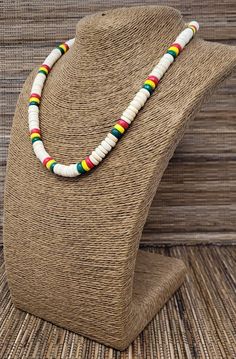 "Rasta Necklace. Handmade Rastafarian Design. Natural Beige Color Wooden Beads. Unisex. Handmade design. Stylish & Minimalist Rastafarian Necklace. Unisex. Necklaces is 19\" inches Around the neck. Comfort Fit Necklace. FAST & FREE SHIPPING! First Class Mail Visit my Etsy Shop to see more Designs! Handmade Rasta Wooden Earrings, Rasta Bracelets and Necklaces. Click here to see more designs: https://www.etsy.com/shop/FreedomLifeStyle" Hippie White Necklace For Gift, Hippie White Necklace As Gift, White Hippie Necklace For Gift, Hippie White Necklace Gift, White Adjustable Hippie Necklace, Adjustable White Hippie Necklace, Jamaican Beaded Jewelry, Rasta Clothes Men, Rasta Beaded Necklace