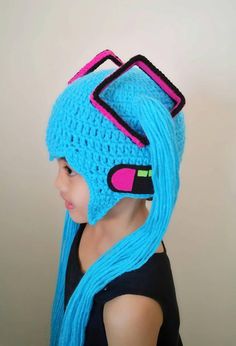 My handmade Hatsune Miku anime crochet wig hat is cute,simple and elegant. The colors look rich and I make sure all orders have close details from the picture with good quality and craftsmanship. This will look good on your baby or girls,women it can be used as baby photos props with anime costume. For moms,mom to be, Who doesn't want their baby or girls looks nice like a pretty anime character? I'll be delighted to crochet this for you. Let me know the exact age and size of the person that will Hatsune Miku Crochet, Miku Crochet, Miku Costume, Anime Crochet, Hat Cosplay, Anime Hats, Crochet Costumes, Crochet Wig, Miku Cosplay