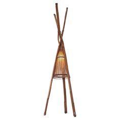 a floor lamp made out of bamboo sticks