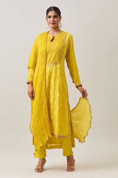 Mustard yellow three fourth sleeves high low panelled kurta in banarasi silk base with pintucked yoke, sleeves and sequin marodi fleur embroidery on the borders. Paired with a thread tassel embellished straight pant and lace border embellished seersucker pattern dupatta. - Aza Fashions Elegant Yellow Long Sleeve Salwar Kameez, Elegant Long Sleeve Yellow Salwar Kameez, Yellow Long Sleeve Anarkali Set With Chikankari Embroidery, Yellow Chikankari Embroidered Traditional Wear With Long Sleeves, Yellow Traditional Wear With Chikankari Embroidery Long Sleeve, Semi-stitched Yellow Long Sleeve Kurta, Yellow Fitted Anarkali Set With Straight Kurta, Semi-stitched Long Sleeve Yellow Kurta, Gold Long Sleeve Slub Silk Kurta