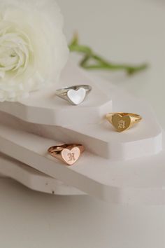 --LosAngelesMinimalist-- Personalized Heart Signet Ring, Gift For Her, Custom Signet Ring, Rings For Women, Initial Rings, Engraved Ring, Sterling Silver Ring Please write your initial with the preferred font number from the font chart. Material: High-Quality Solid 925 Sterling Silver Finish: Gold, Silver, Rose Gold The ring is finished with either 14K gold fill, rose gold fill, or 925. sterling silver. We craft our jewelry with a passion for customer satisfaction. Most of our products are craft Heart Shaped Initial Ring For Gift, Heart Shaped Initial Ring Gift, Heart-shaped Initial Ring Gift, Heart-shaped Rings With Initials For Gift, Personalized Heart Ring As A Gift, Heart-shaped Initials Ring Perfect For Gifts, Heart-shaped Metal Ring Jewelry For Gifts, Adjustable Heart-shaped Couple Rings Gift, Heart Charm Open Ring For Gift