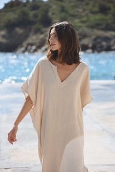 The Cala Kaftan // Moon Oversized V-neck Tunic For Beach Cover-up, Oversized Summer Tunic With V-neck, Casual Linen V-neck Kaftan, Summer Oversized V-neck Tunic, Oversized V-neck Summer Tunic, Casual Beige V-neck Tunic, Beige V-neck Kaftan For Vacation, Summer Oversized V-neck Kaftan, Chic Beige Tunic For The Beach