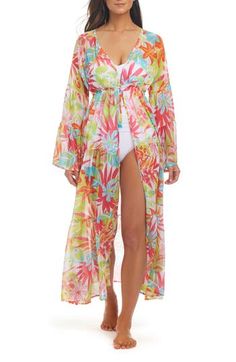 Move from beach to cocktails in this enchanting chiffon cover-up designed with a fluttery silhouette that's covered in vibrant flowers and tropical fronds. Front tie closure Plunge neck Long sleeves Sheer 100% polyester Hand wash, line dry Imported V-neck Chiffon Beach Cover-up, Beach Party Tropical Print Cover-up, Multicolor Poolside Cover-up For Resort Season, Multicolor Beach Cover-up For Beach Season, Multicolor Cover-up For Beach, Sheer Flowy Cover-up For Vacation, Multicolor Cover-up For Beach Party, Multicolor Beach Party Cover-up For Summer, Beachwear Dress For Summer Vacation Parties