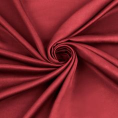 a close up shot of a red fabric