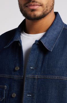 A hint of stretch helps this staple denim jacket get softer with each wear while its boxy silhouette underscores its vintage vibe. 26" length Front button closure Spread collar Chest button-flap patch pocket; side-seam pockets Button cuffs Adjustable button side tabs 99% cotton, 1% elastane Machine wash, tumble dry Made in the USA of imported fabric Classic Denim Utility Jacket With Patch Pockets, Relaxed Fit Dark Wash Denim Jacket With Welt Pockets, Unstructured Denim Outerwear With Button Closure, Classic Relaxed Fit Single Breasted Denim Jacket, Classic Unstructured Denim Outerwear, Classic Relaxed Fit Denim Jacket With Buttons, Relaxed Fit Denim Jacket With Lapel Collar, Classic Collared Denim Jacket, Classic Collared Denim Jacket For Everyday