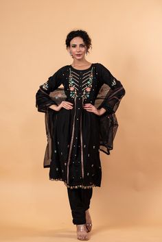 Stunning embroidery and print details adorn this round-neck Kurti set. The set includes a Kurti, pants, and dupatta, and features 3/4 length sleeves. Three beautiful components, one flawless ensemble. Anarkali Palazzo Set With Floral Embroidery For Festivals, Floral Embroidered Anarkali Set For Eid, Navratri Anarkali Set With Floral Embroidery, Festive Black Floral Embroidered Palazzo Set, Anarkali Style Black Palazzo Set With Floral Embroidery, Black Anarkali Palazzo Set With Floral Embroidery, Festive Black Palazzo Set With Floral Embroidery, Anarkali Sets With Floral Embroidery For Festive Season, Anarkali Churidar With Floral Embroidery And Straight Kurta