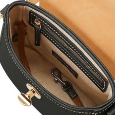 Elevate Your Everyday  With traditionally tanned pebble leather, stunning contrast, and an exciting new jewelry grade closure, this look is a total showstopper. Monogram Pendant, Tan Cowhide, Black Polish, Saddle Leather, Credit Card Wallet, Dooney And Bourke, Leather Texture, New Jewelry, Dooney & Bourke