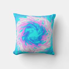 a blue and pink swirl pillow on a white wall with the words, don't touch