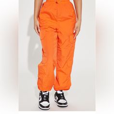 Bright Orange Captivating Parachute Pants! Comfortable And Never Worn, New With Tags Lounge Bottoms With Pockets, Trendy Solid Nylon Pants, High-waisted Parachute Pants With Side Pockets, Fall High Waist Nylon Bottoms, High Waist Nylon Bottoms For Fall, Nylon Pants With Elastic Waistband, Trendy High Waist Parachute Pants With Elastic Waistband, Trendy Solid Nylon Bottoms, Trendy Baggy Nylon Pants