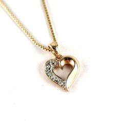 "Vintage Gold over Sterling Silver Open Heart with One Diamond Pendant Necklace. The nice sterling box chain measures about 18\" long and is marked R (Ross Simons) Italy, 925. The little dainty heart pendant measures about 5/8\" tall including the bail x 1/2\" wide. It is marked R925, China and weighs about 3.2 grams. Its in good used condition. Add this pretty heart to your collection today! Visit our FAQ section: https://www.etsy.com/shop/KayZees?ref=hdr_shop_menu#more-section If you have any questions please don't hesitate to ask!" Valentine's Day Necklace With Box Chain And Heart Pendant, Valentine's Day Gift Heart Necklace With Box Chain, Elegant Heart Necklace With Box Chain, Valentine's Day Heart Pendant Necklace With Box Chain, Valentine's Day Heart Necklace With Box Chain, Valentine's Day Anniversary Box Chain Necklace, Heart Pendant Necklace With Box Chain As Gift, Heart Pendant Necklace With Box Chain For Gift, Box Chain Necklace For Mother's Day Anniversary