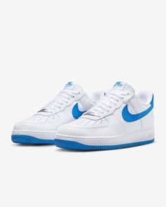 Elevate your sneaker game with these Nike Air Force 1 '07 in size 13, featuring a fresh white and photo blue colorway. The low top shoe shaft style and athletic type make it perfect for any casual occasion. The FJ4146-103 style code and Nike branding on the model add a touch of authenticity to your look. This shoe is a must-have for any Nike fan and would make a great addition to your collection. The shoe is brand new without the lid, and is not customized. Don't miss out on your chance to own these stylish and comfortable sneakers. Air Force Men, Nike Mens Shoes, Shoes Air Force, Nike Branding, Nike Air Force 1 07, Mens Nike Shoes, Nike Air Force 1 Low, Sneaker Games, Air Force 1 Low